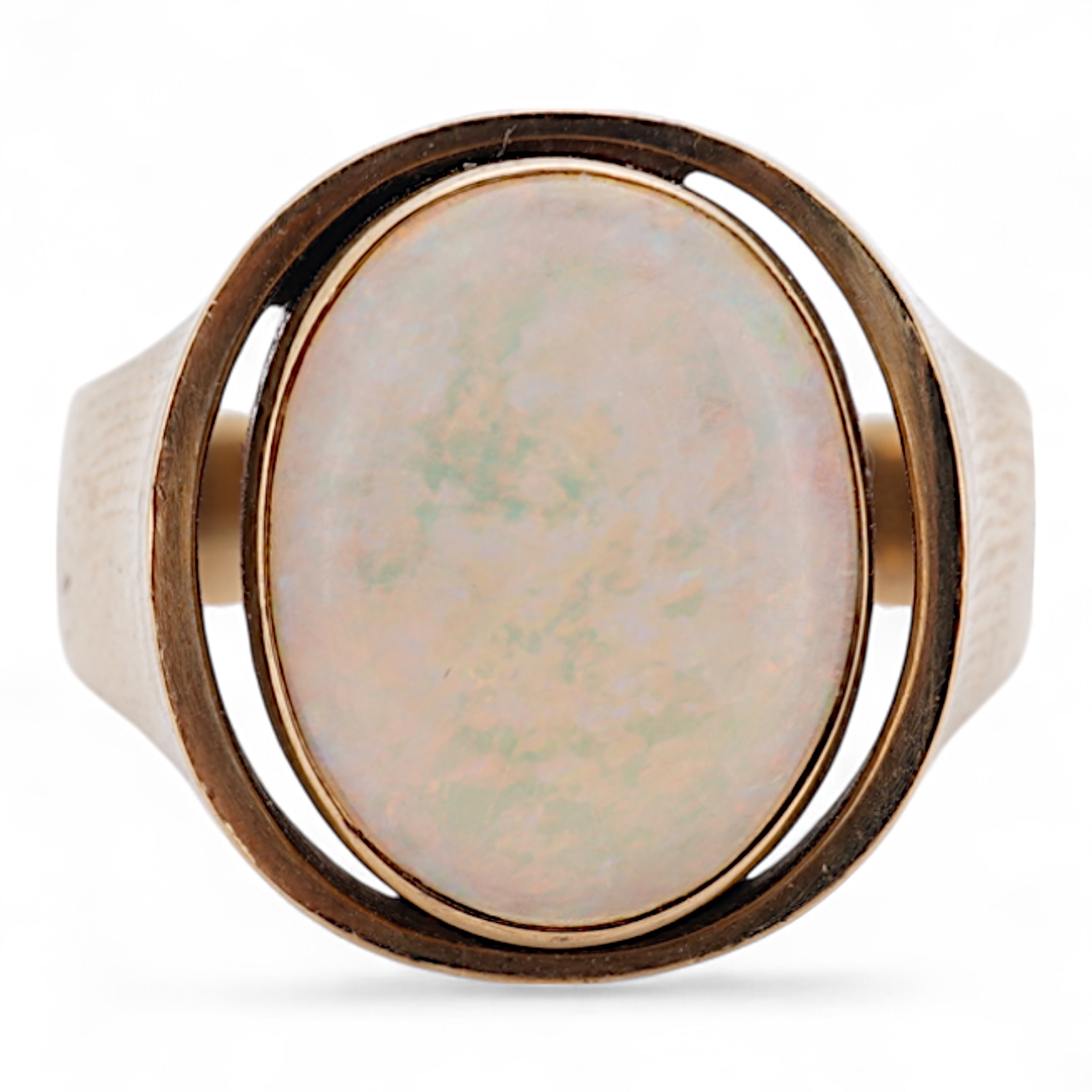 A 9ct and single stone cabochon white opal set ring, size K/L, gross weight 5 grams.